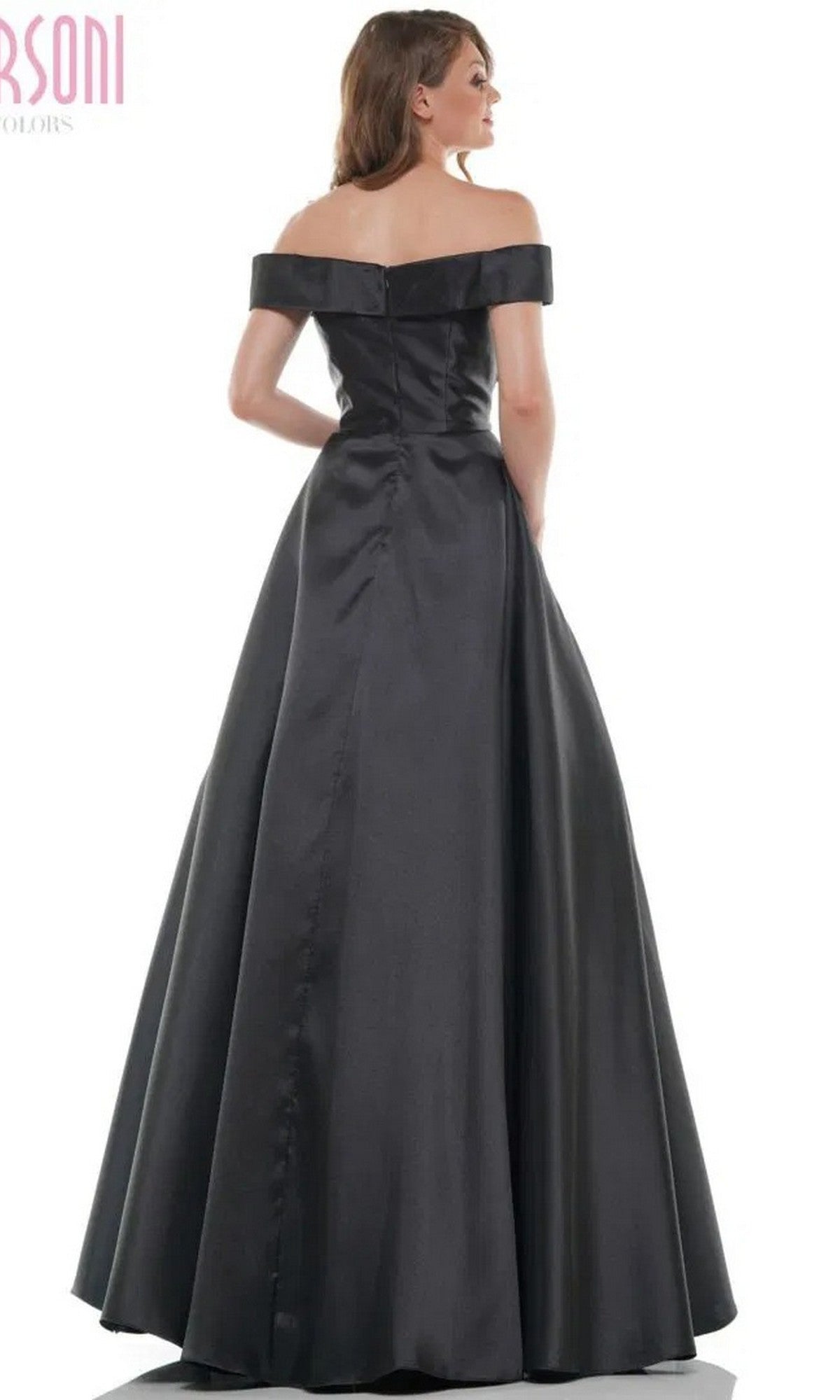 A woman is shown from the back, standing against a plain white background and wearing the Marsoni MV1008 long black off-the-shoulder formal dress.